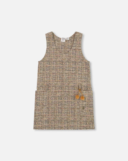 Pull en tweed beige et noir