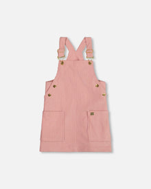 Robe salopette en velours côtelé vieux rose
