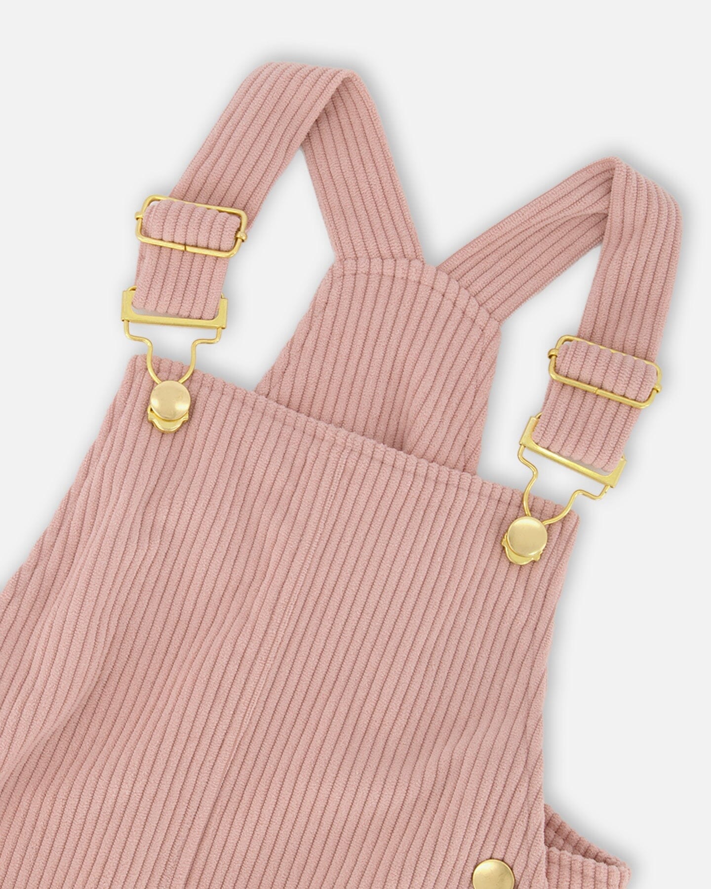 Robe salopette en velours côtelé vieux rose