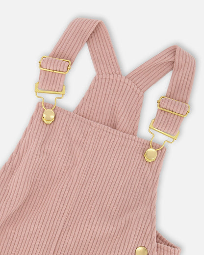 Robe salopette en velours côtelé vieux rose