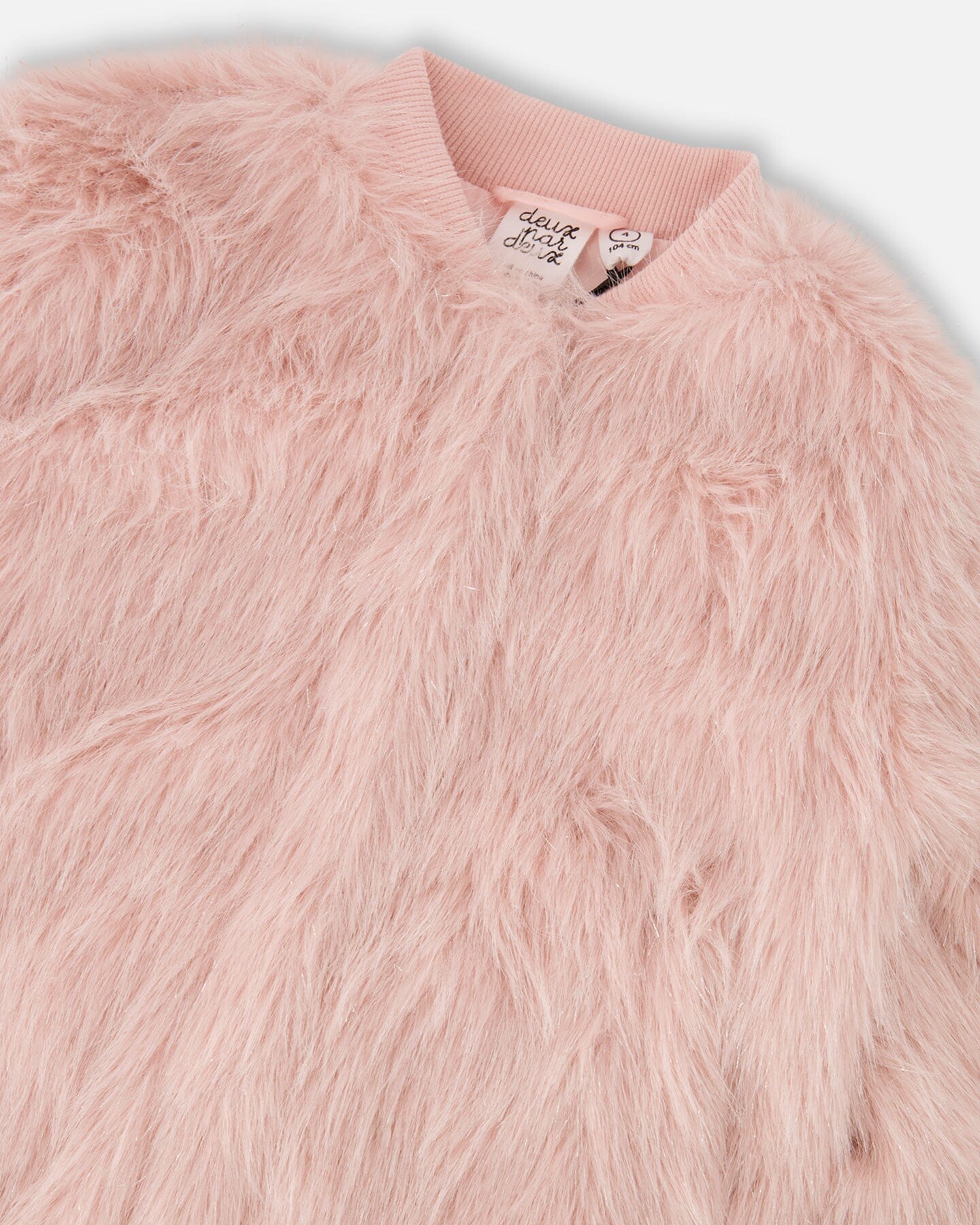 Manteau court en fausse fourrure rose poudré
