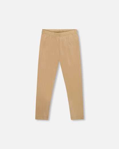 Legging extensible brillant beige doré