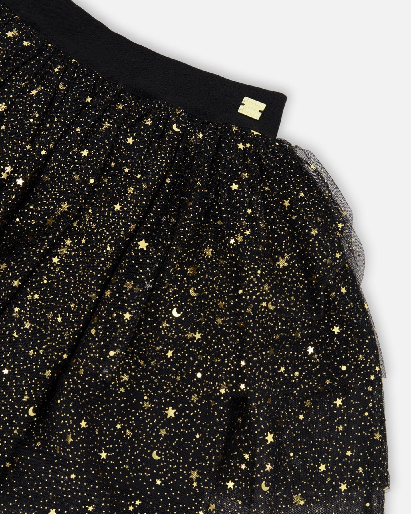 Jupe noire en maille scintillante multicouche