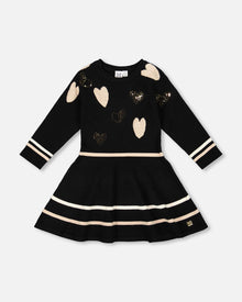 Robe en maille noire à motifs cœurs pailletés