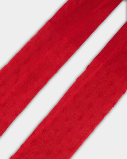 Collant en maille rouge avec motif étoile ton sur ton