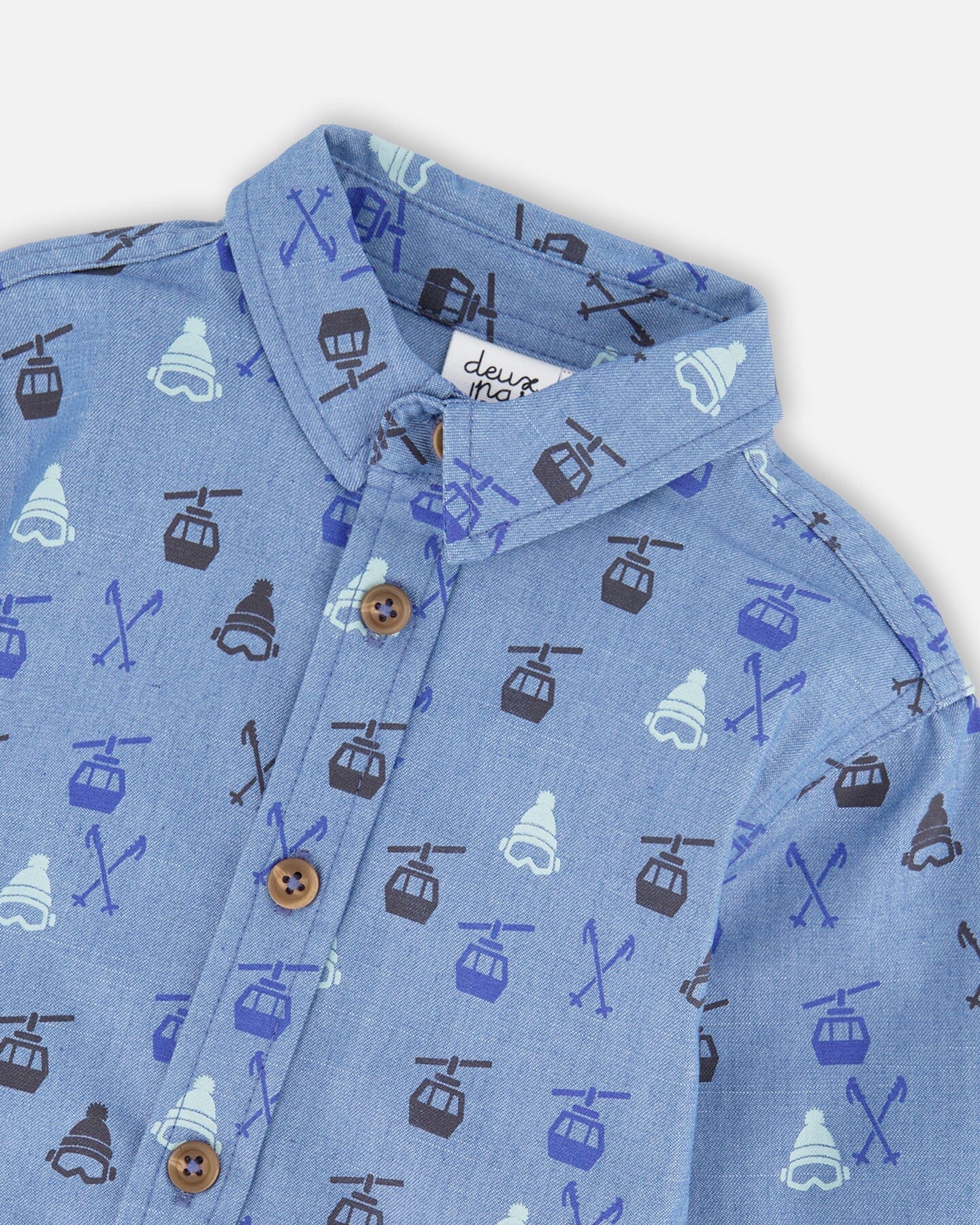 Chemise en chambray bleue imprimée à manches longues et boutonnée devant