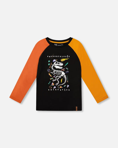 T-shirt noir à manches longues et coupe raglan avec imprimé dinosaure phosphorescent