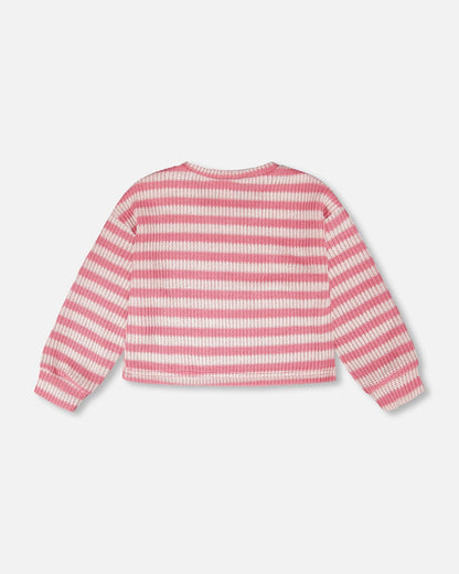 Pull rayé rose et blanc