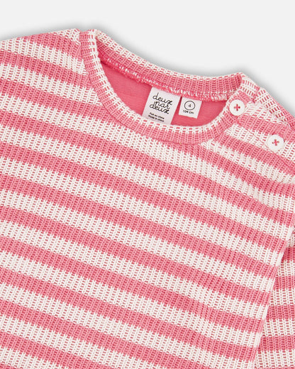Pull rayé rose et blanc