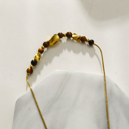 Chaîne texturée peau de serpent HAVANA avec breloques en or et œil de tigre