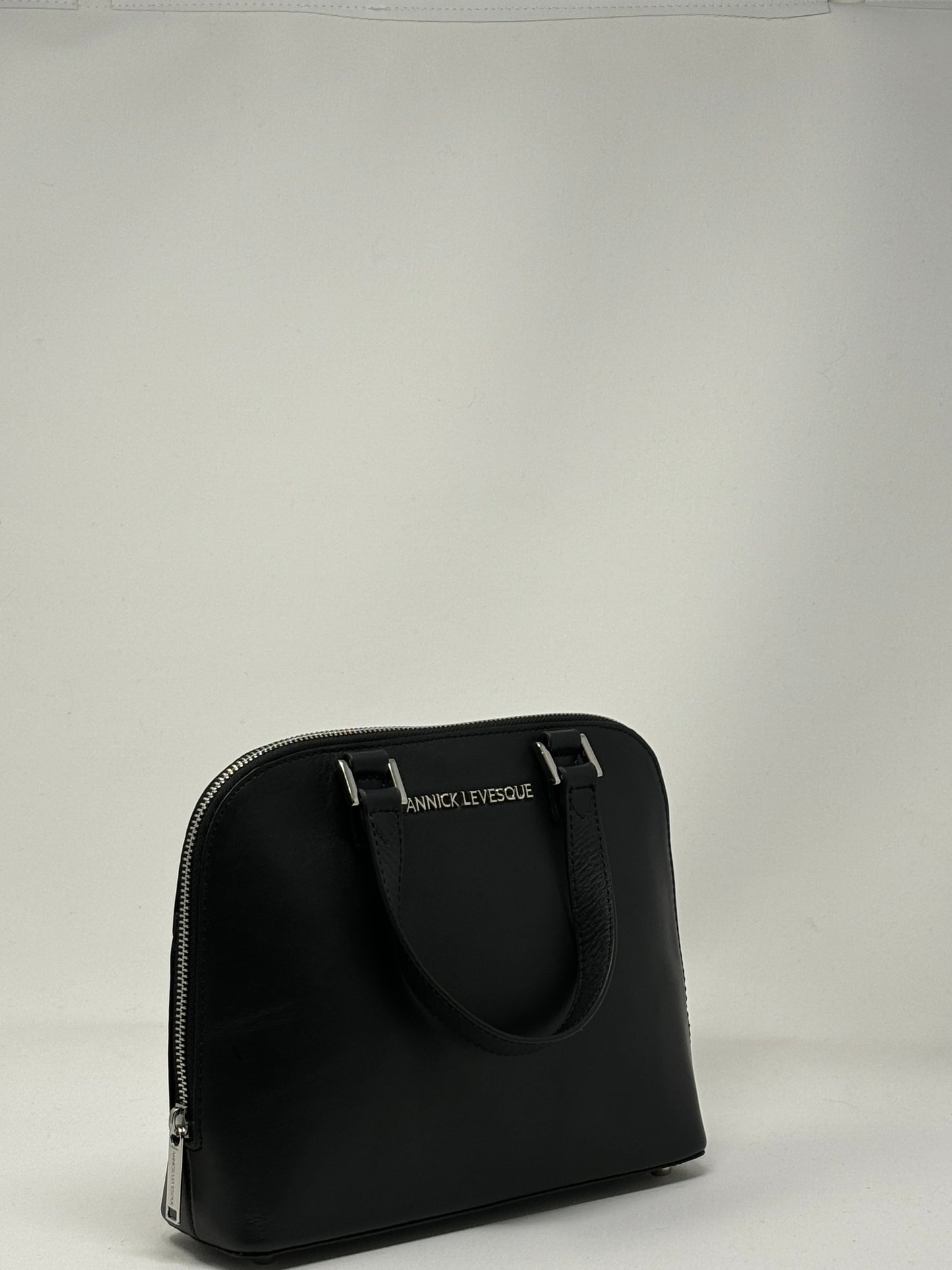Black leather handbag, Justine
