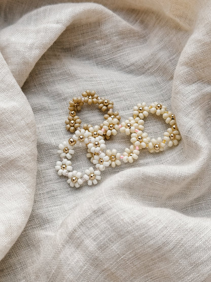La collection de bagues Daisy Chain