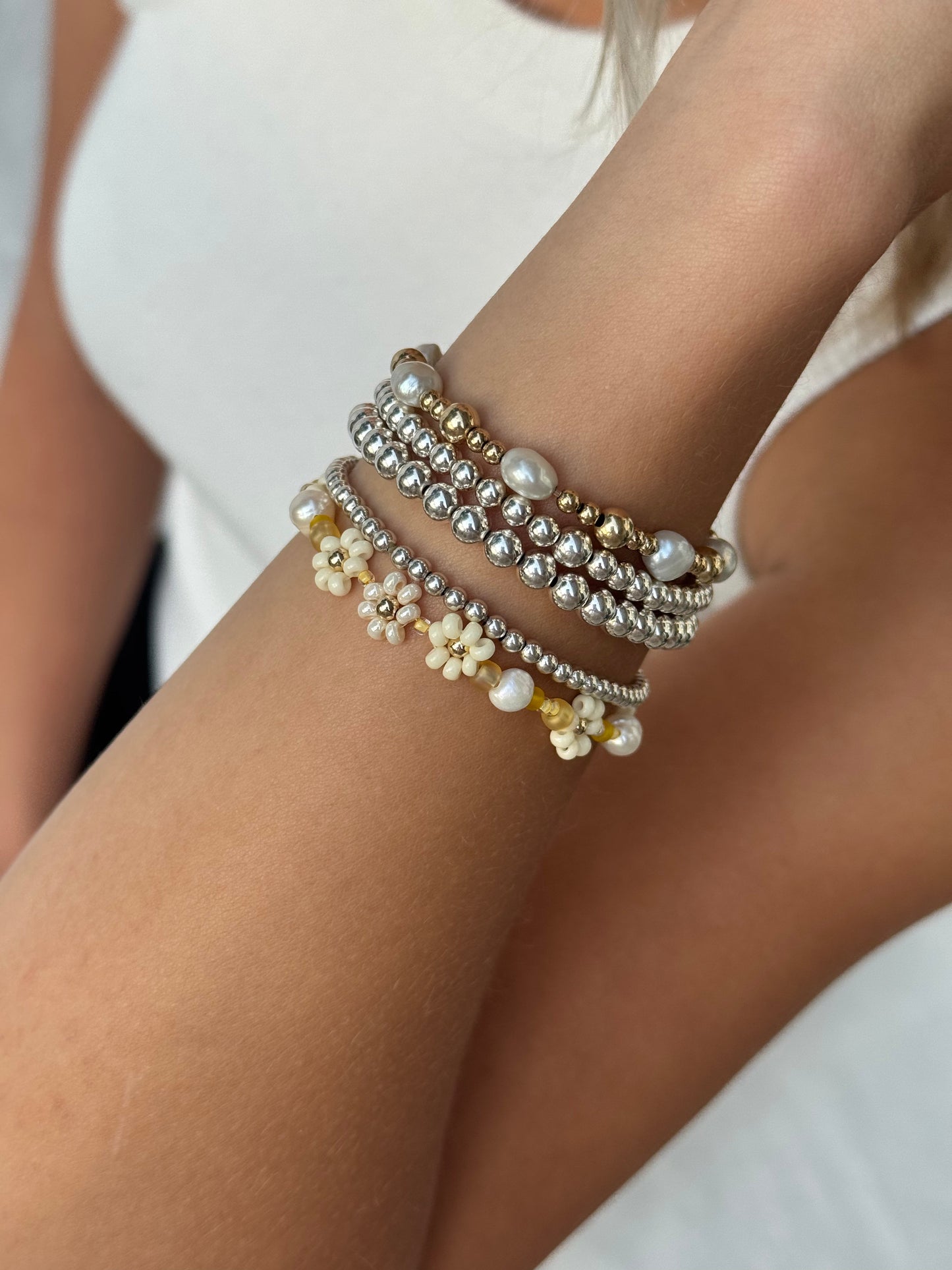 Le bracelet et la chaîne de cheville Daisy couleur « Bouton d'or »