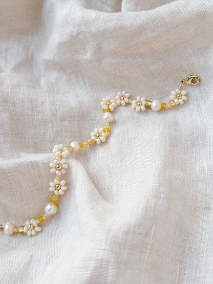 Le bracelet et la chaîne de cheville Daisy couleur « Bouton d'or »