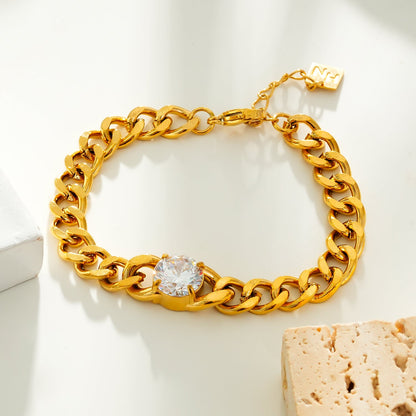 JATDAL Gold : Bracelet maille cubaine avec un saphir moissanite étincelant en pièce maîtresse