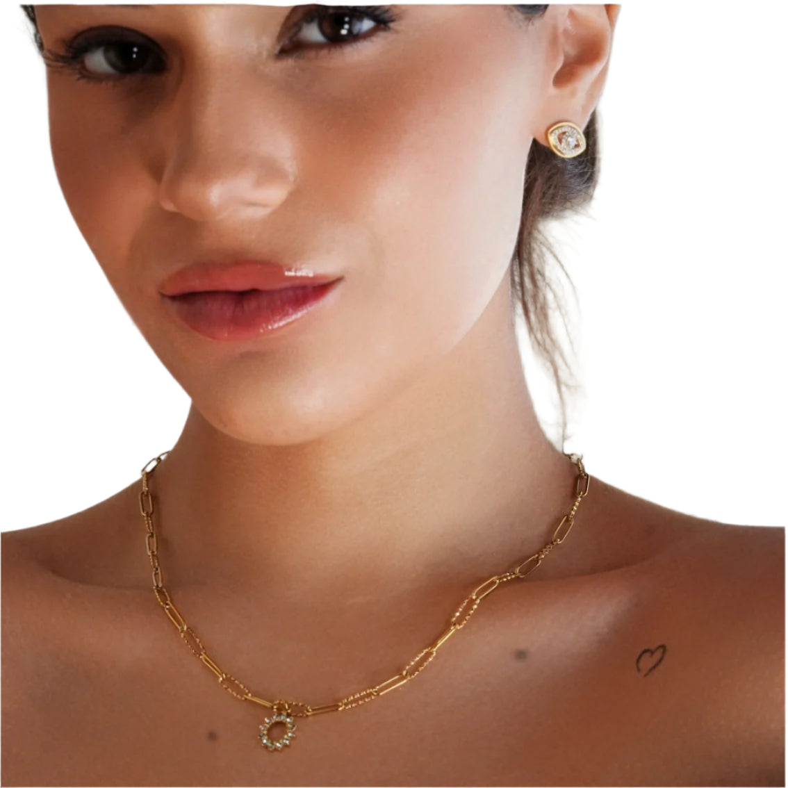 FRETTA : Collier à Pendentif Étoile Rayonnante en Zirconium avec Chaîne Trombone en Plaqué Or.