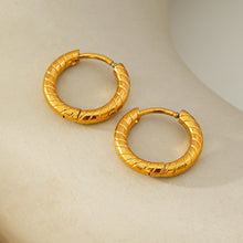 LUPITA: Swirl Design Textured Hoop Earrings in Gold