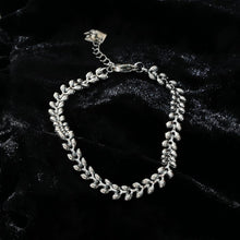 MAGDA Argent (Or blanc) : Bracelet large à motif feuillage