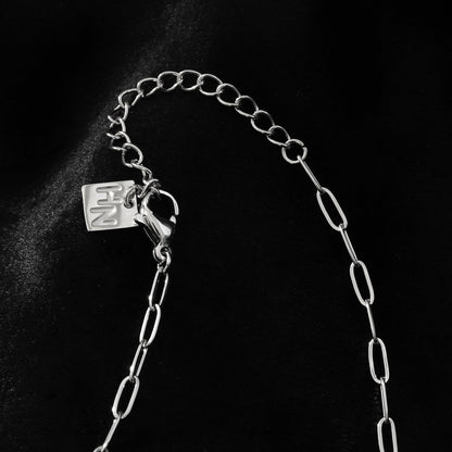MALIBU : Collier à maillons associant des coquillages naturels et du métal plaqué or blanc (ton argent)