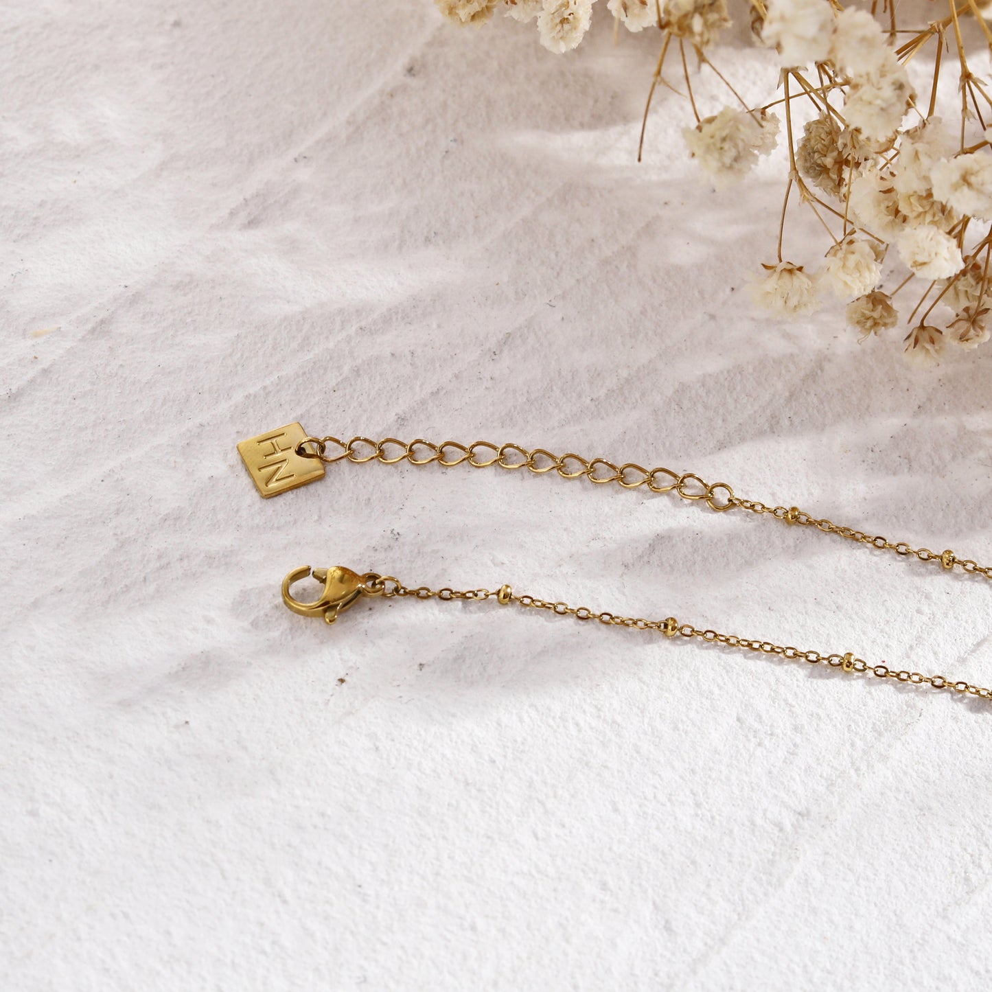 MALVINA Collier chaîne dorée avec pendentif étoile serti de zirconiums