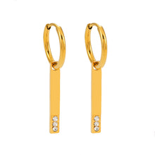 Style MAYLA: Gold Hoops with a Minimalist Charm featuring a Trio of Zirconia Gemstones