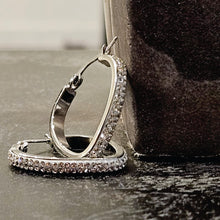 Style MELFI Silver: Abstract Heart Shaped Hoops embedded with Zirconia Gemstones