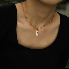 Chaîne Morna avec pendentif géométrique or et zircons
