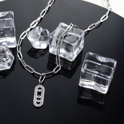 MORNA Chaîne trombone avec pendentif géométrique orné de zircons Argent