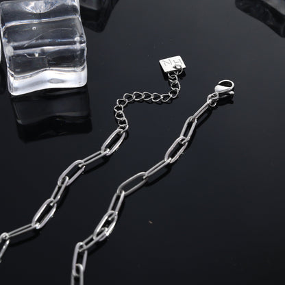 MORNA Chaîne trombone avec pendentif géométrique orné de zircons Argent