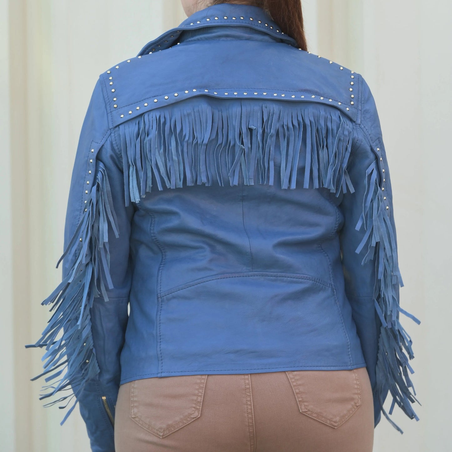 Blouson en cuir clouté pour femme avec franges amovibles