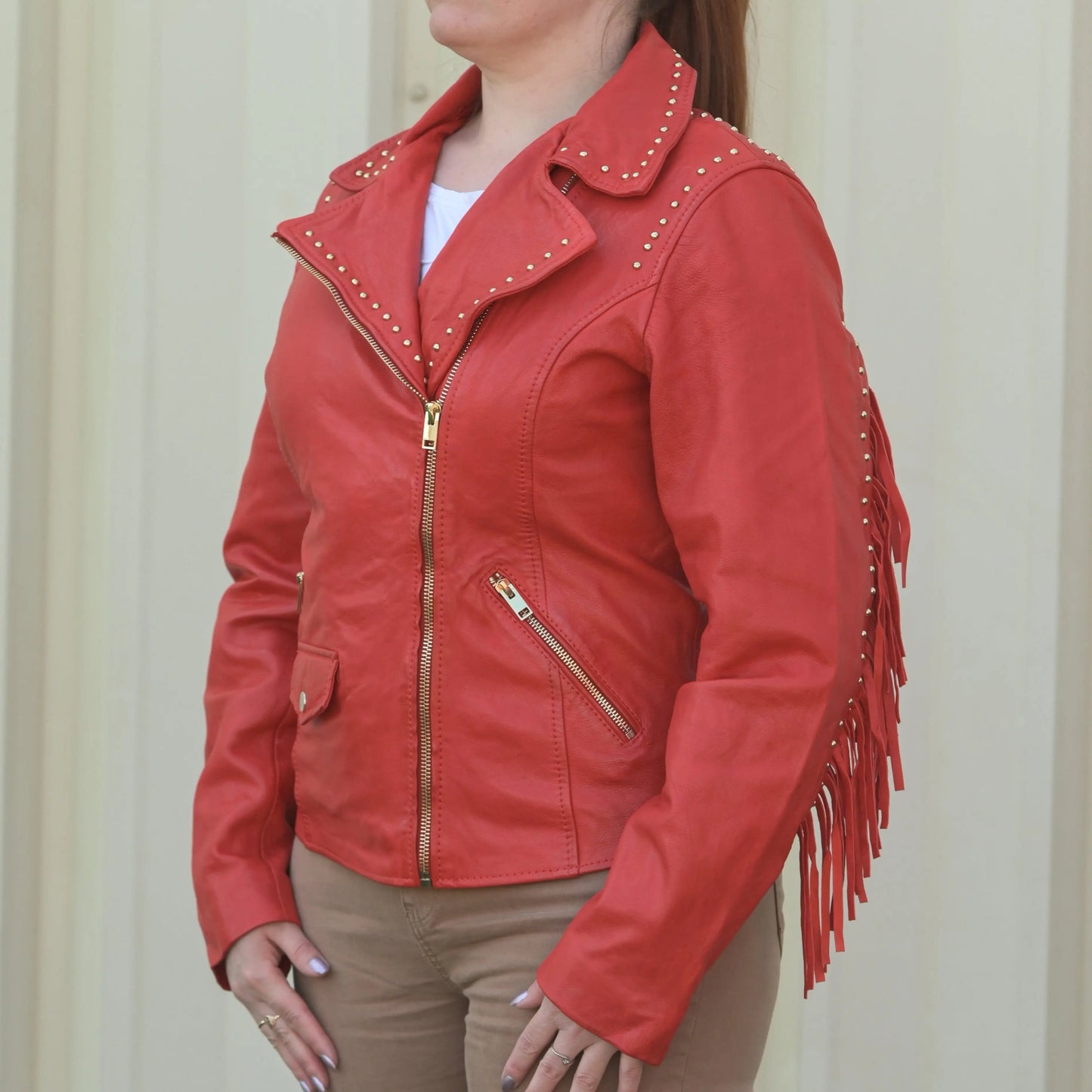 Blouson en cuir clouté pour femme avec franges amovibles