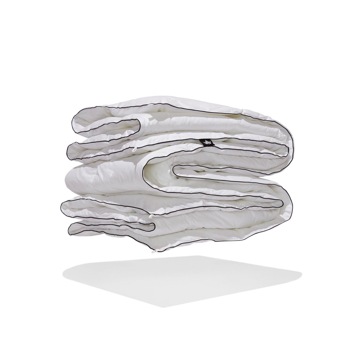 Couette en microfibre avec garnissage synthétique aspect duvet