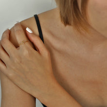 NICOLE Gold: Textured Ring with a Four Point Star Centre Piece