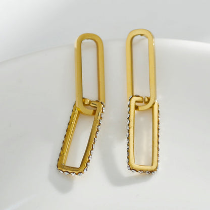 Boucles d'oreilles LUCIA Pavé Zirconium double trombone dorées