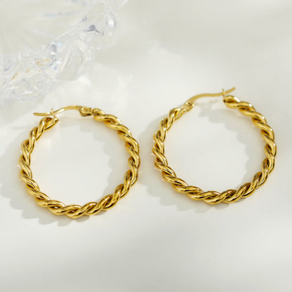 Boucles d'oreilles créoles torsadées dorées SUKI