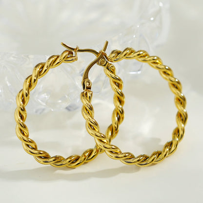 Boucles d'oreilles créoles torsadées dorées SUKI