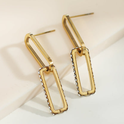 Boucles d'oreilles LUCIA Pavé Zirconium double trombone dorées
