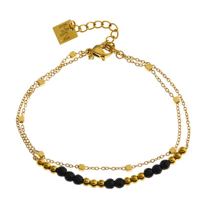 HILDA : Bracelet deux-en-un perles carrées et perles rondes en noir et or.