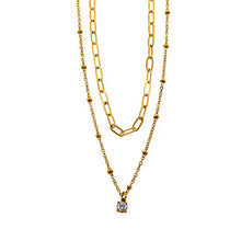 KATERI Gold: Pre-Layered Chains Necklace with a Solitaire Zirconia Charm Pendant