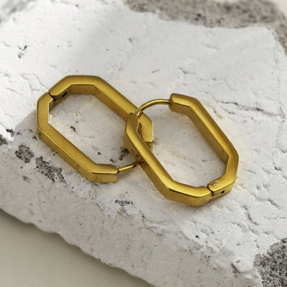 Boucles d'oreilles créoles contemporaines de forme géométrique CACCURI (Dorées et argentées)