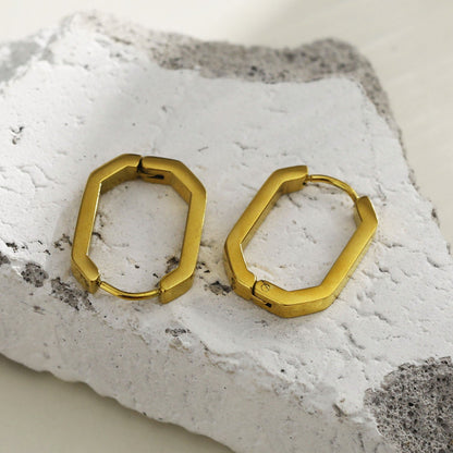 Boucles d'oreilles créoles contemporaines de forme géométrique CACCURI (Dorées et argentées)