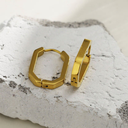 Boucles d'oreilles créoles contemporaines de forme géométrique CACCURI (Dorées et argentées)