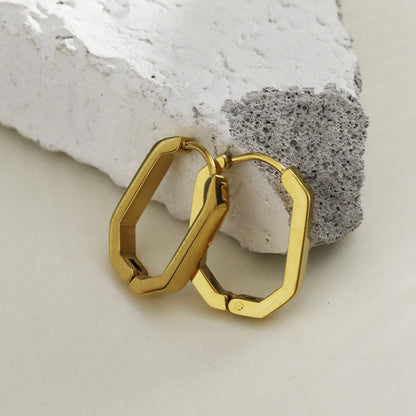 Boucles d'oreilles créoles contemporaines de forme géométrique CACCURI (Dorées et argentées)