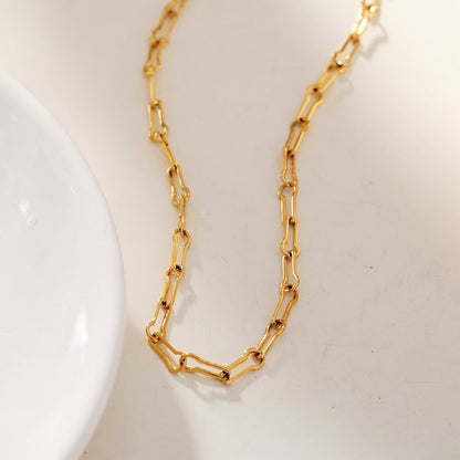 TIASA : Collier chaîne en or à trombones asymétriques