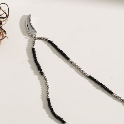 RITA Collier chaîne perlé noir et argent avec pendentif dent argent gravé