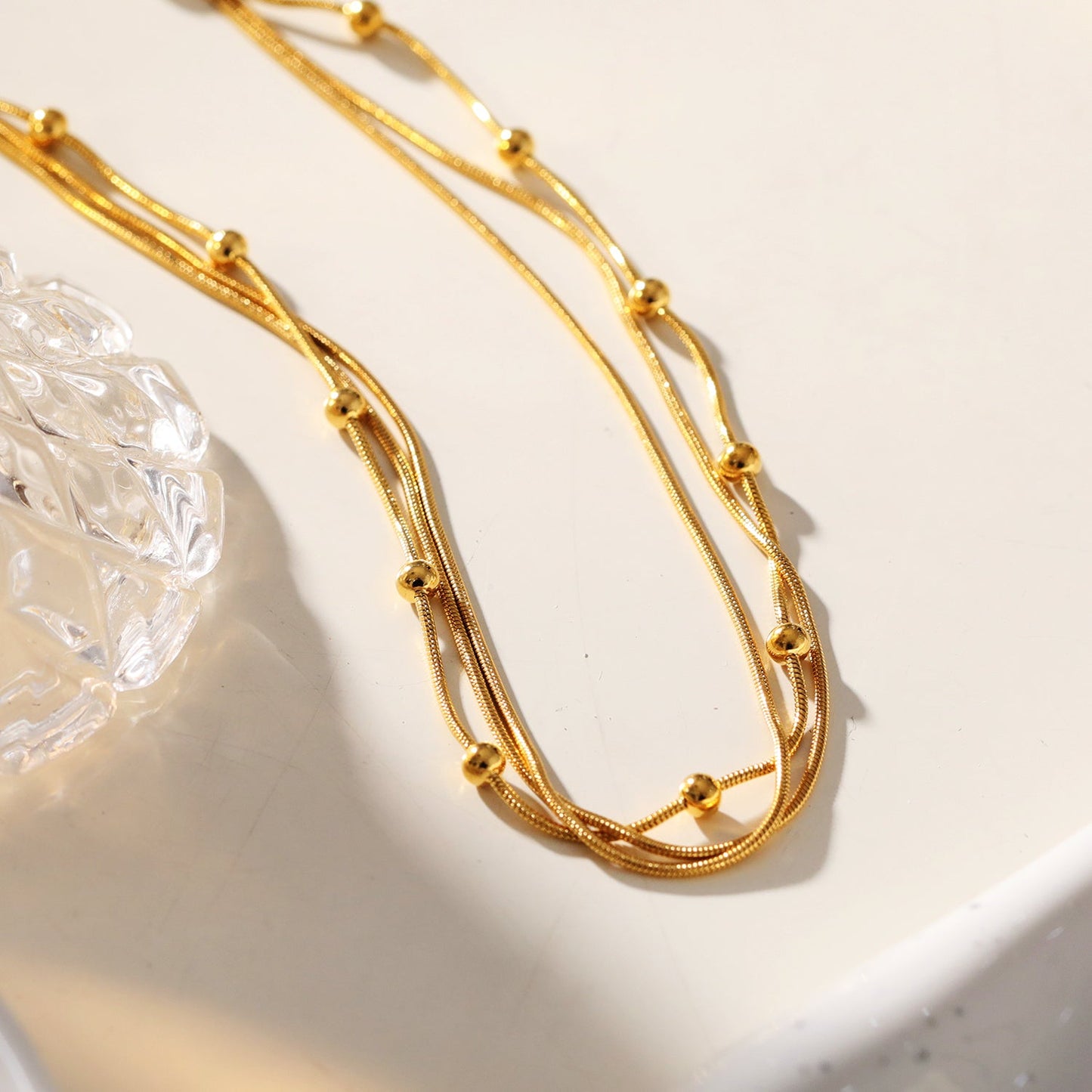 KAKIA : Collier superposé Triple Chaîne Peau de Serpent avec perles