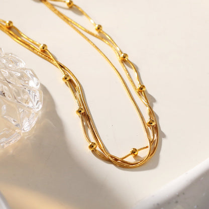 KAKIA : Collier superposé Triple Chaîne Peau de Serpent avec perles