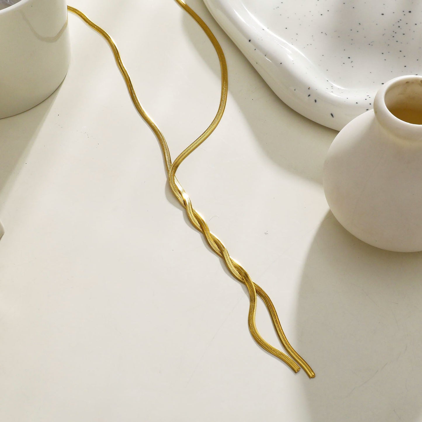 Collier chaîne torsadée type lasso GILMA avec texture peau de serpent