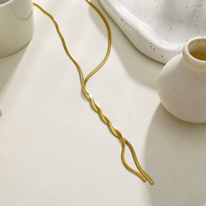 Collier chaîne torsadée type lasso GILMA avec texture peau de serpent