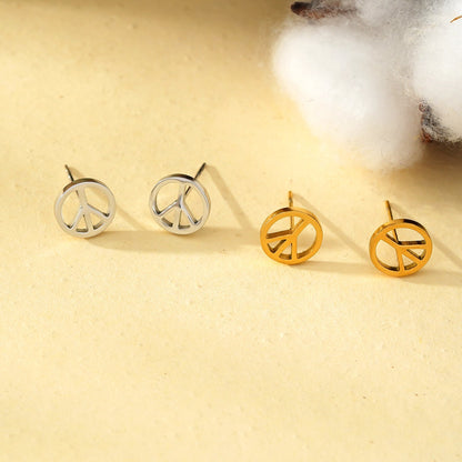 Boucles d'oreilles clous logo PEACE en argenté (or blanc)